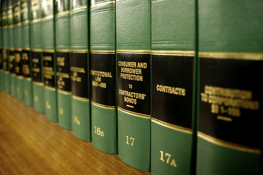 Close up of several volumes of law books of codes and statutes o