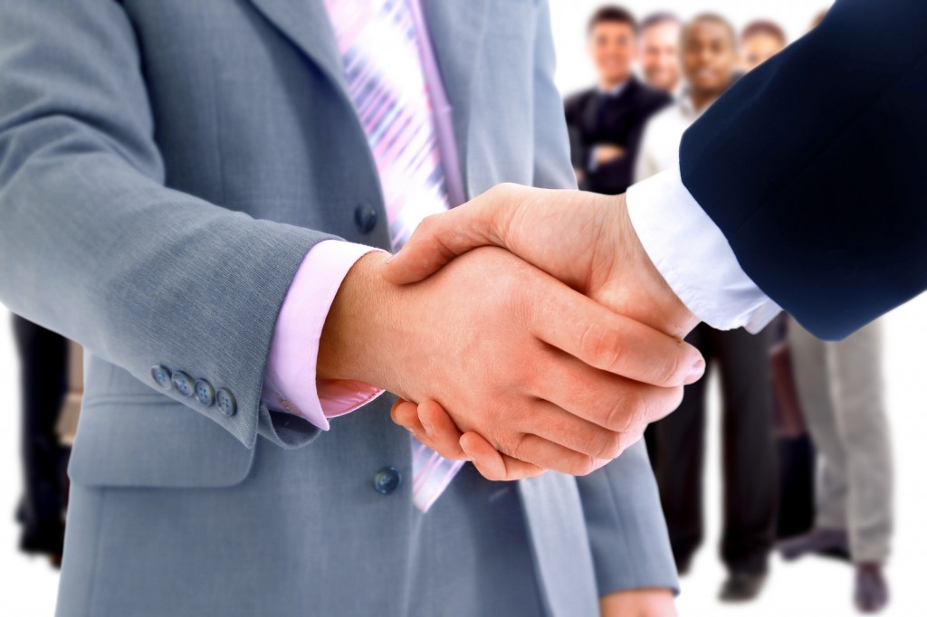 handshake isolated on business background